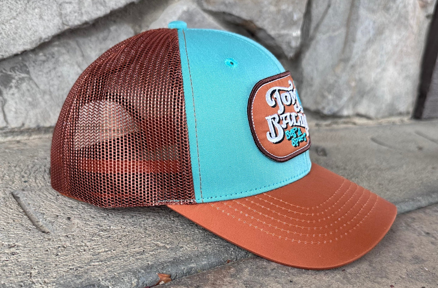 Gorra n.° 52 NUEVA color naranja quemado y turquesa con logotipo clásico